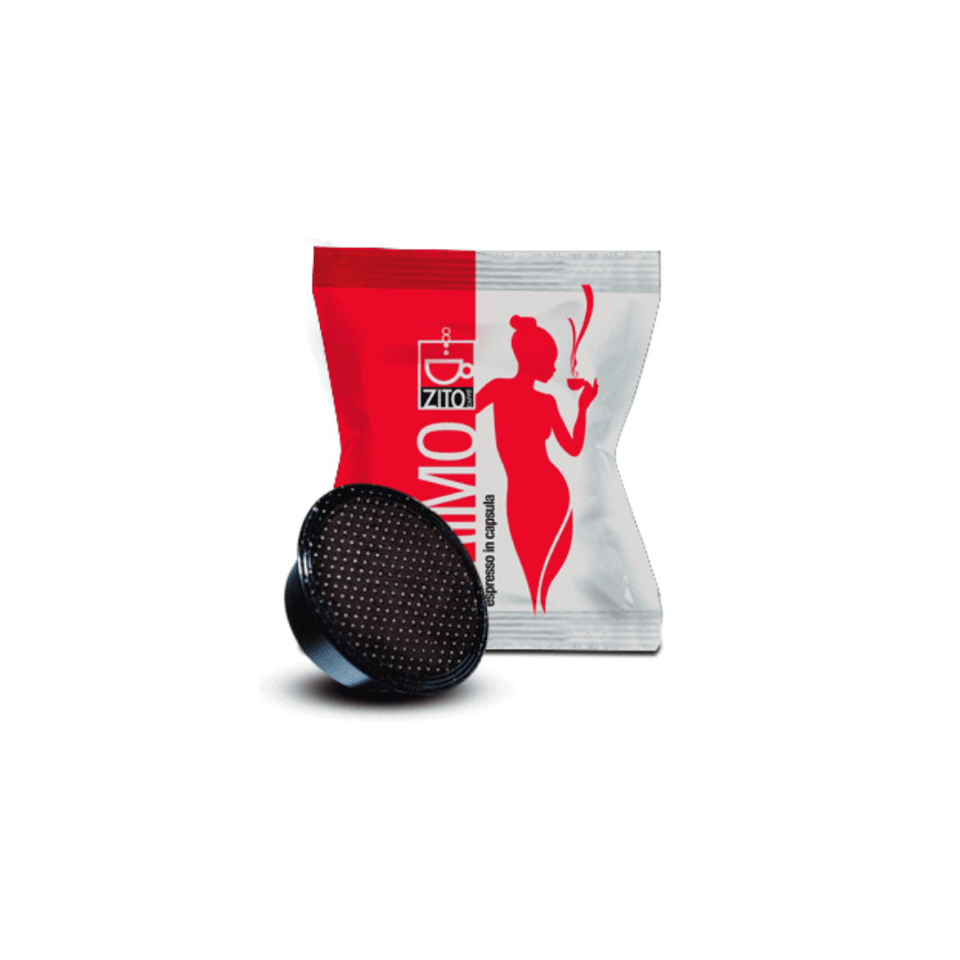 a bag of coffee sitting next to a lavazza a modo mio coffee capsule
