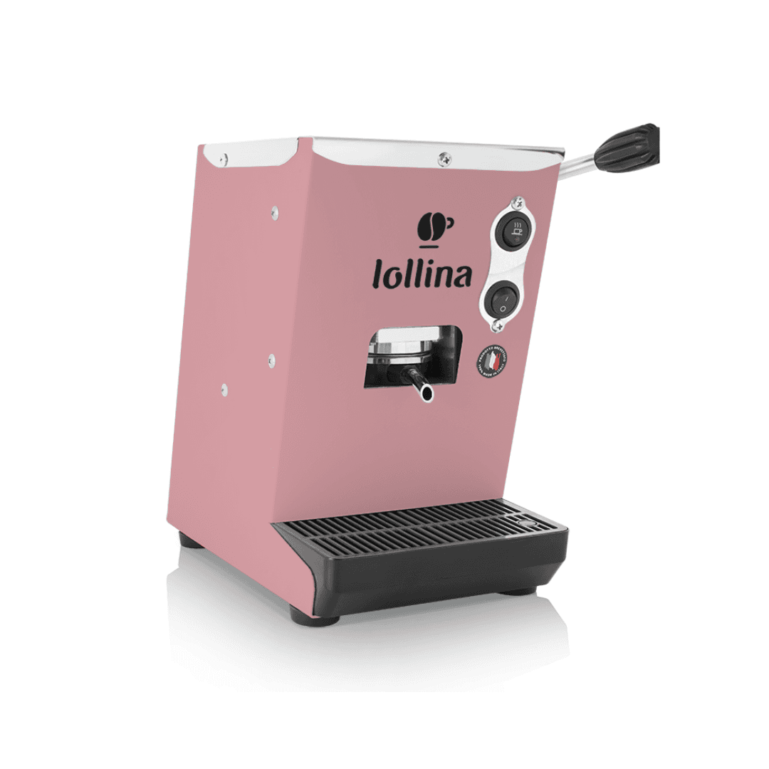 a pink coffee machine sitting on top of a counter