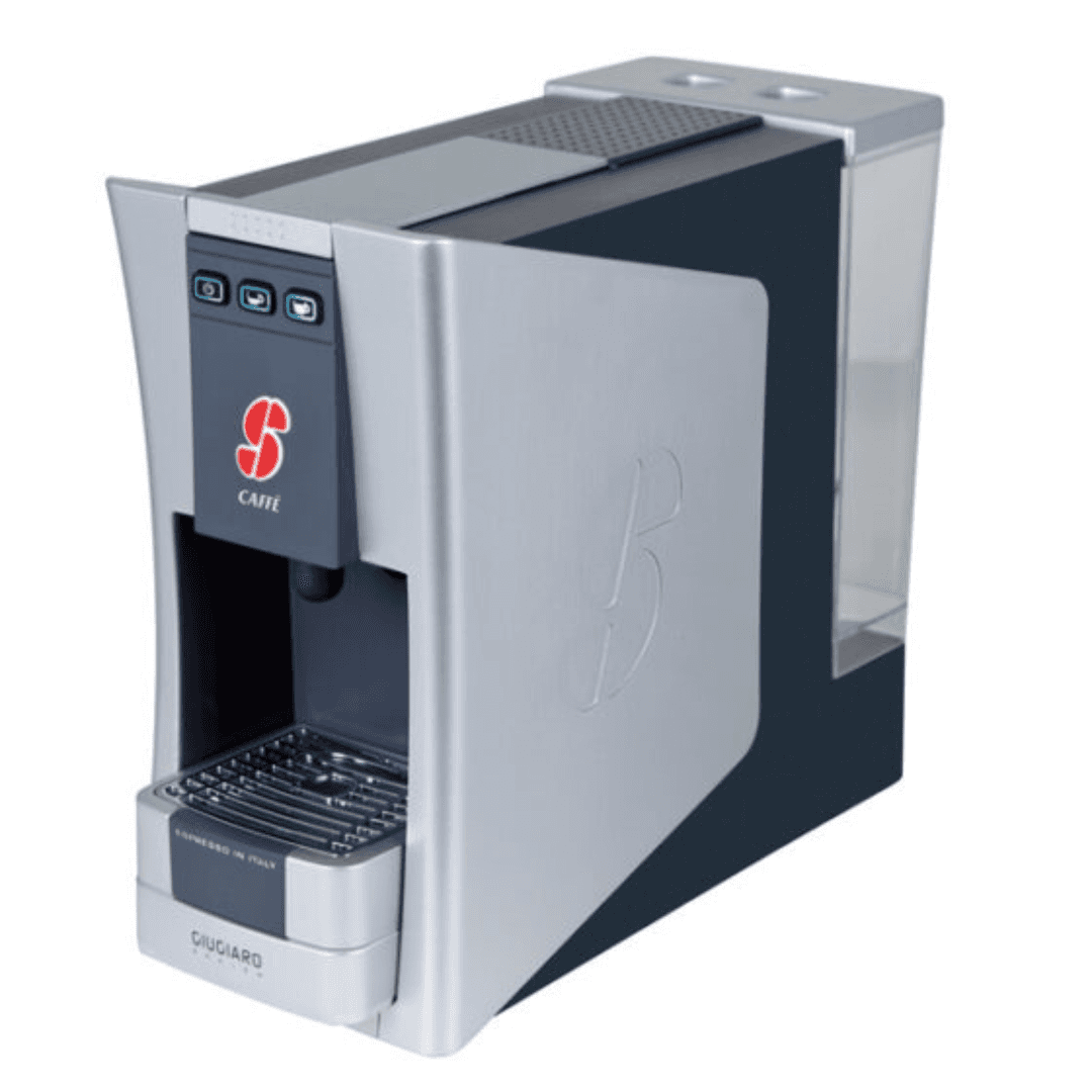 a silver and black coffee machine with a red and white sticker on it