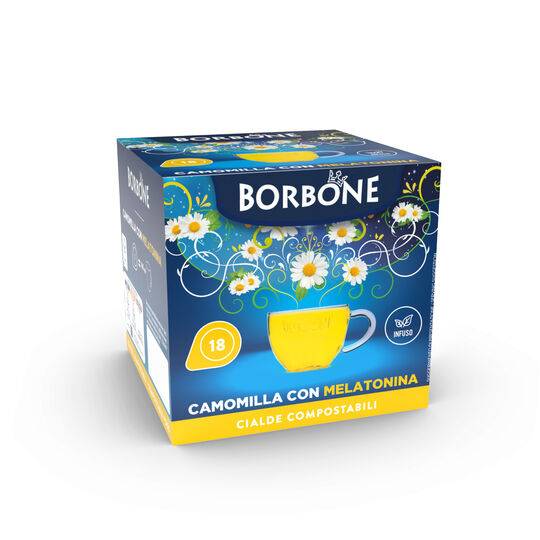 a box of borbone tea with daisies