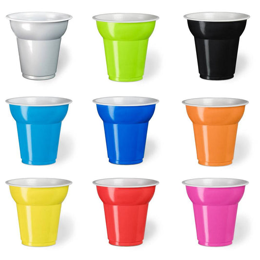 a group of different colored cups sitting next to each other