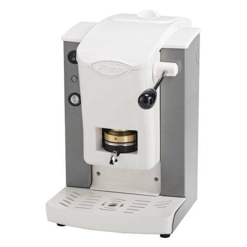 a white coffee machine sitting on top of a counter