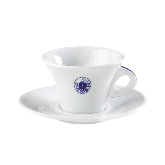 a cup and saucer on a white plate