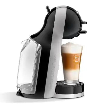 a black and white coffee maker with a cup of coffee