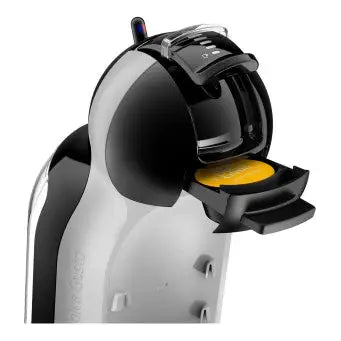 a black and white penguin with a yellow button